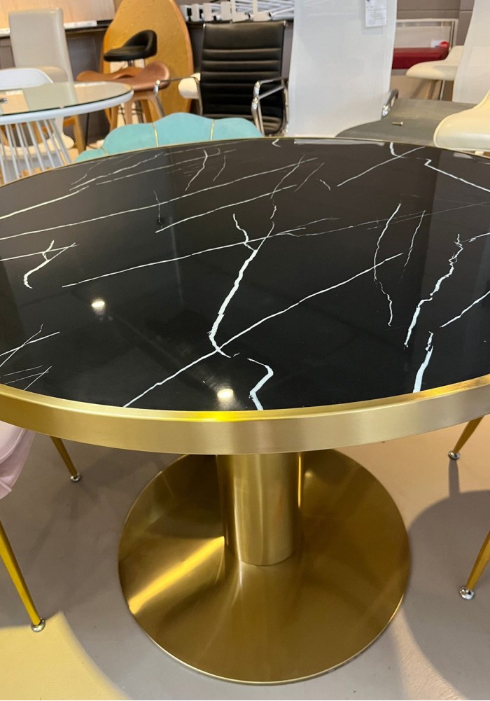 Nika round shop dining table